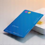 Hand holding a sleek physical corporate card